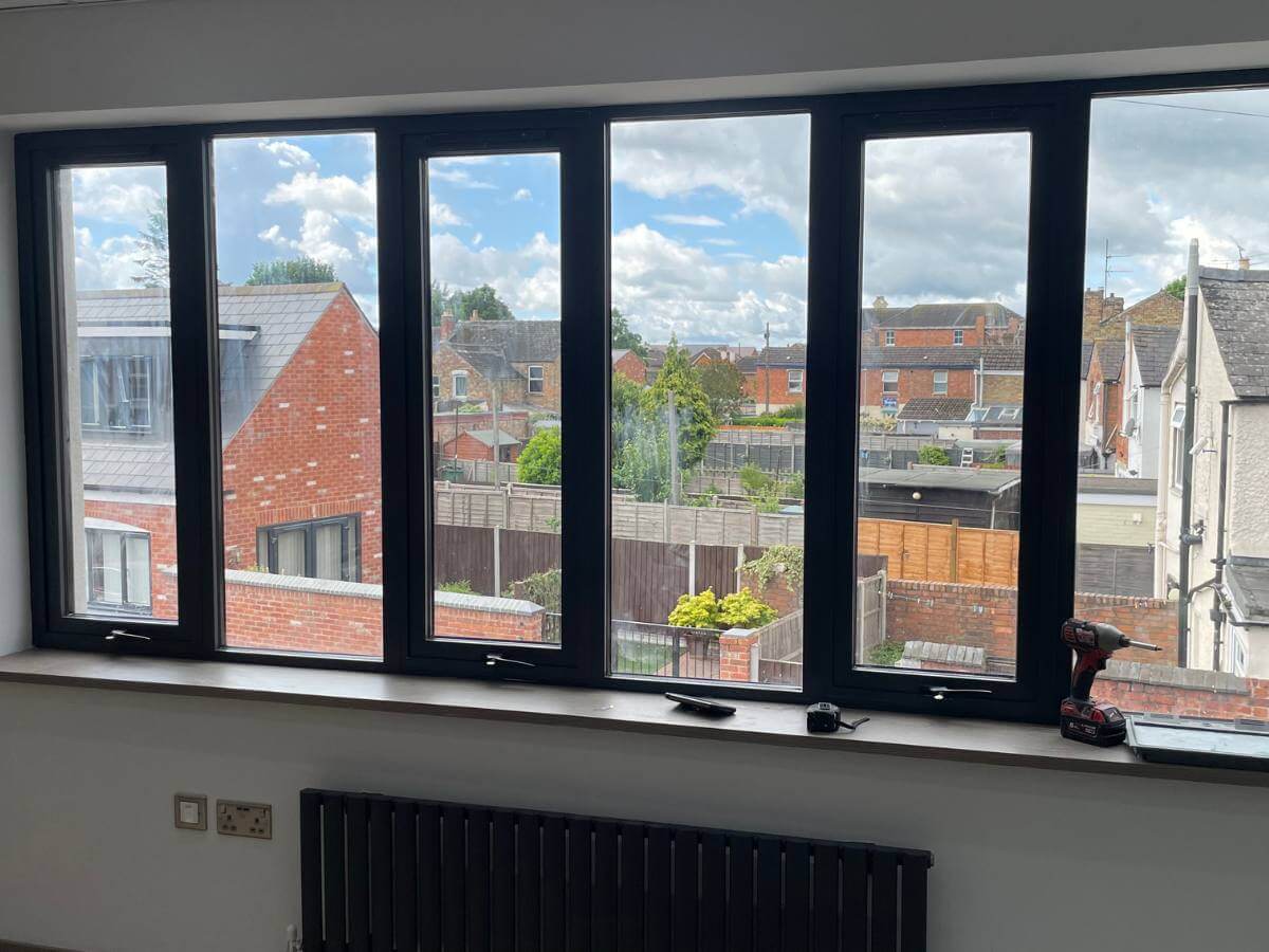 Made to measure aluminium casement windows installed inside London home