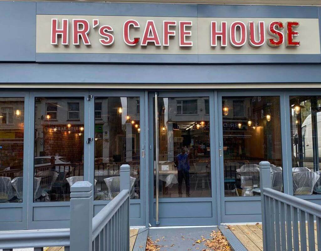 Aluminium bifold door installation for HR's Cafe House in Hornchurch by Redwood Shop Front