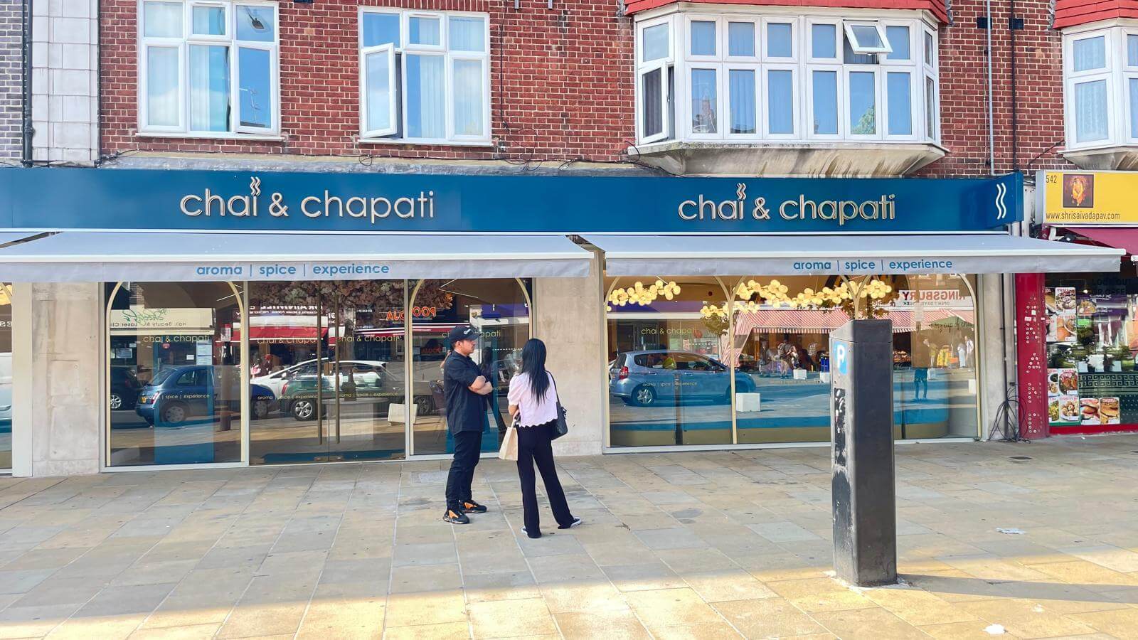 Frameless glass shopfront installation in Kingsbury, London for Chai & Chapati by Redwood Shopfront