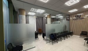 Internal frameless glass office partitions with frosted privacy film installed at a Barking law firm by Redwood Shopfront