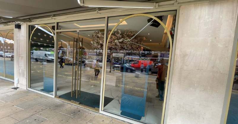 Frameless toughened glass shopfront with minimal visible fittings London